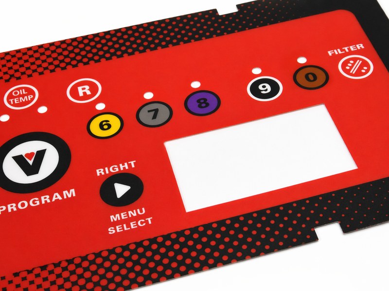 Red polycarbonate control panel overlay manufactured by Metallics, Inc. with color-coded numbered buttons, oil temperature and filter icons, menu controls, and a display cutout.