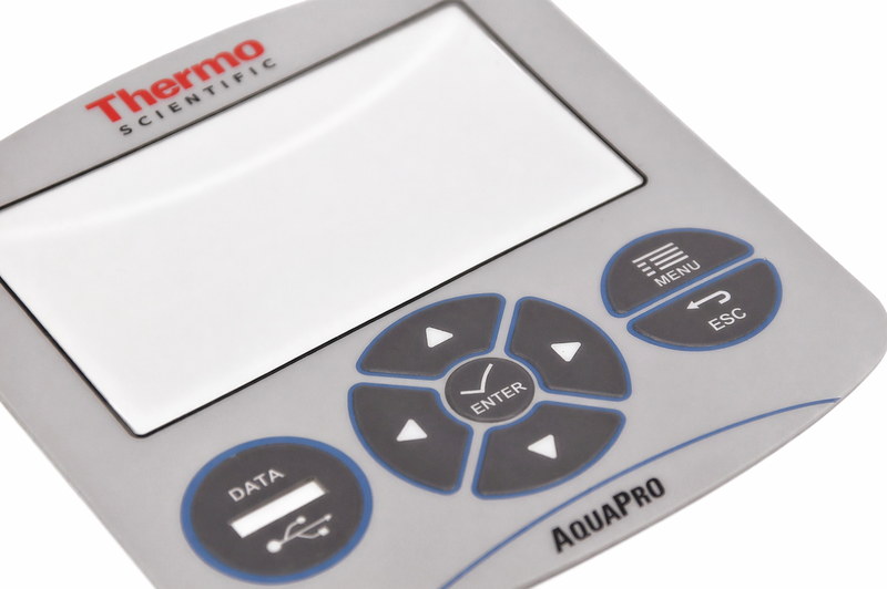Control panel overlay manufactured by Metallics, Inc. for the Thermo Scientific AquaPro, featuring a display window, directional buttons, menu controls, and embossed key areas.